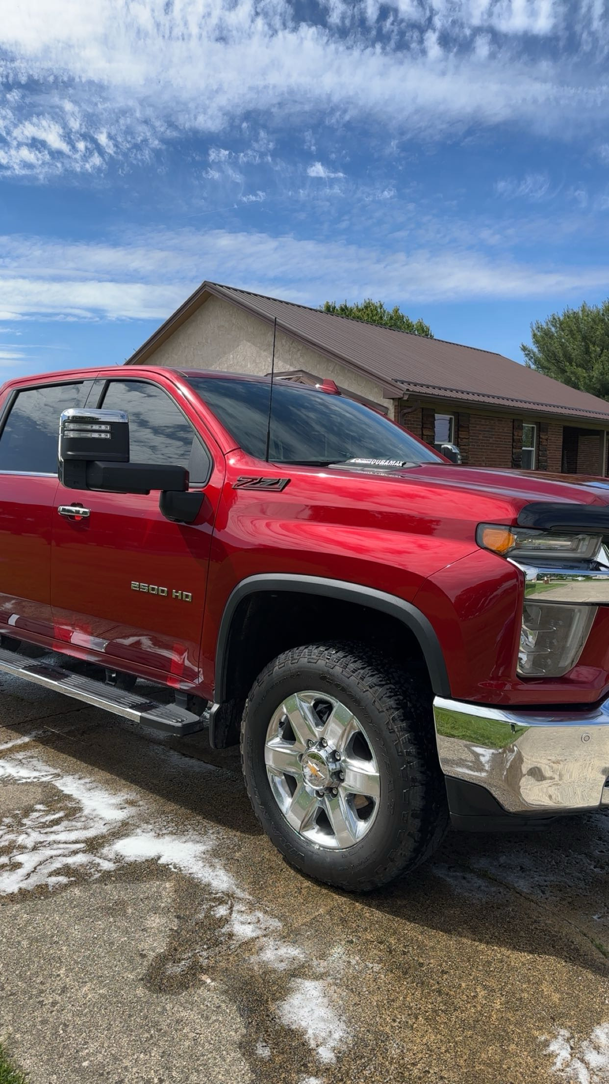 Clean red Chevy truck after an exterior wash