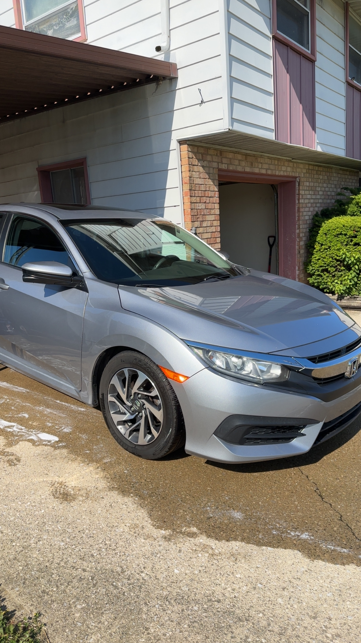 Clean black Honda exterior after a premium detail